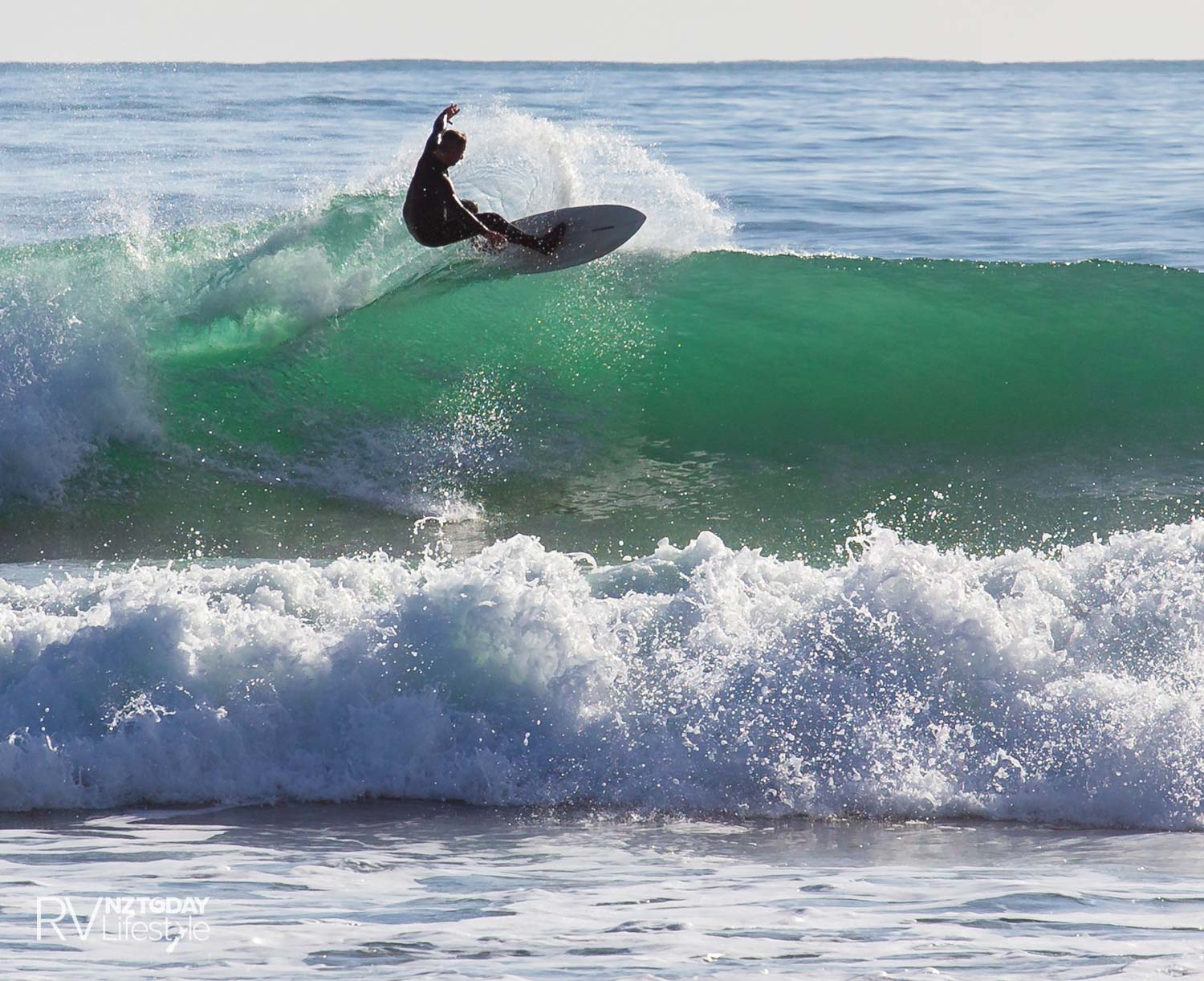 A surfer enjoys an afternoon session near Fitzroy Beach